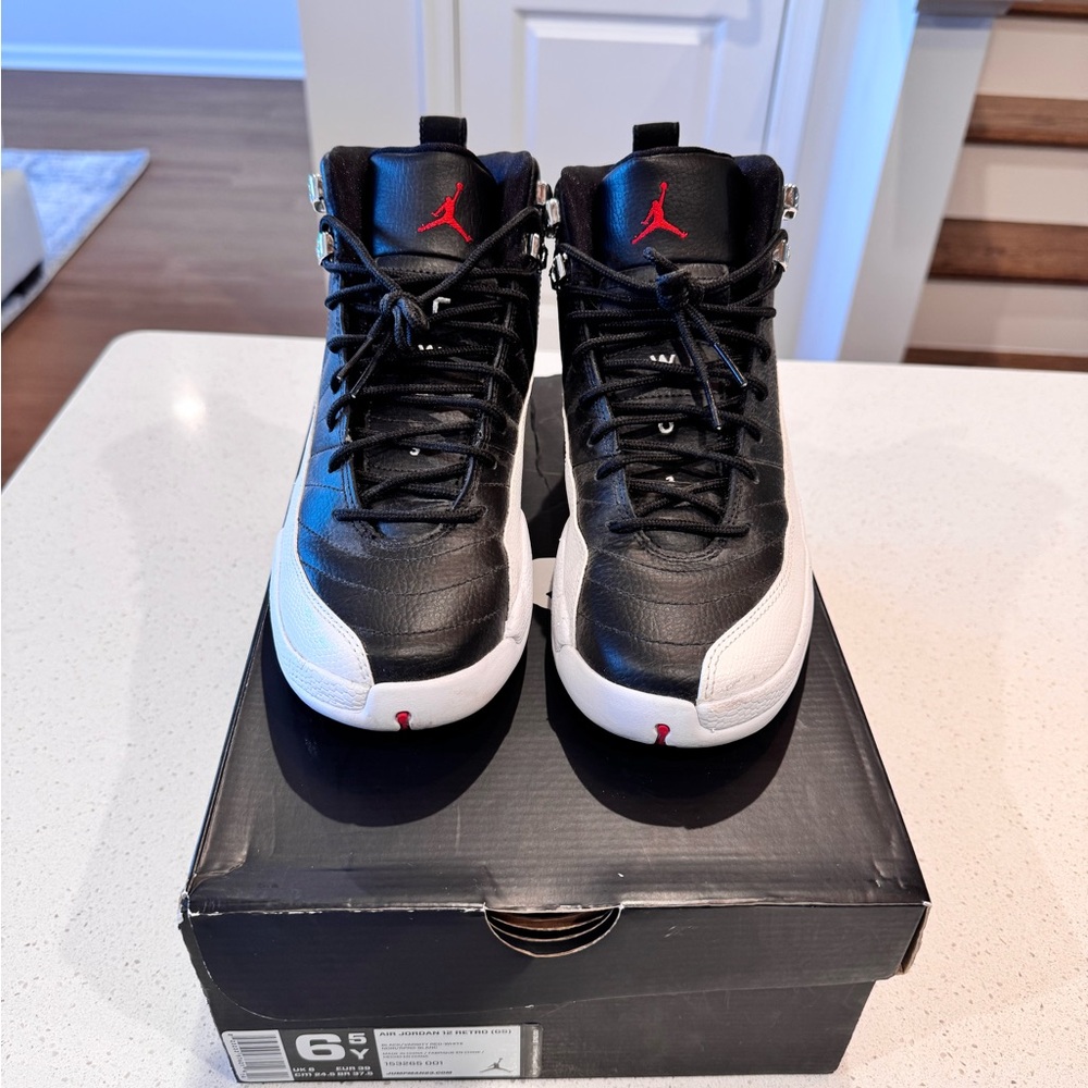Jordan 12 Retro Playoffs men size 6.5, women’s size 8